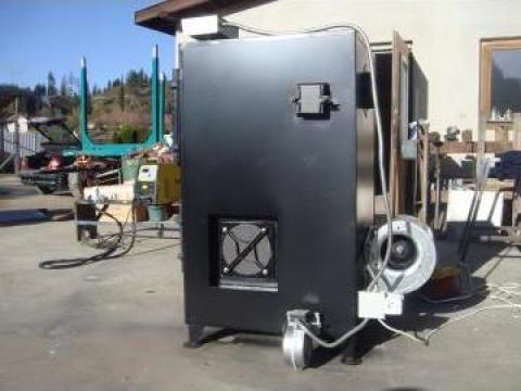 Generator de aer cald pe combustibil solid